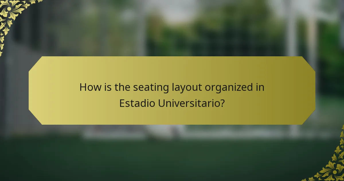 How is the seating layout organized in Estadio Universitario?